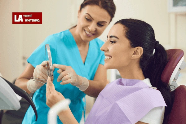 A dentist providing aftercare instructions for maintaining lazer teeth whitening results Hemel-Hempstead